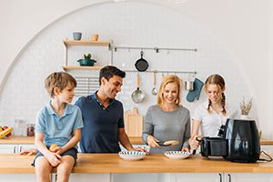 Family With Air Fryer - Difference Between an Air Fryer and an Oven